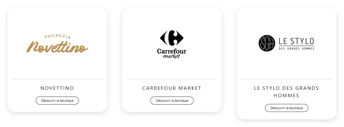 Annuaire des boutiques : trois cartes avec logos, noms et accès aux fiches.